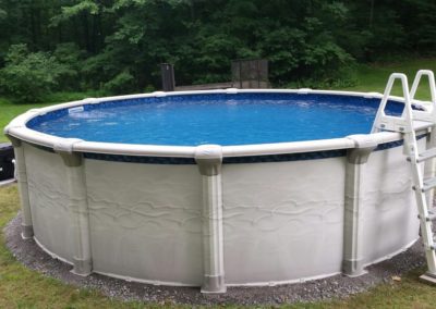 Oval Above Ground Pool in Complete Deck